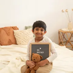 So proud to be a big brother. Using a letterboard is a super cute way to announce his new role in the family.