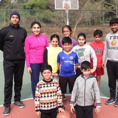 Our coaches and players build strong bonds. This group photo captures the friendly and supportive atmosphere we cultivate at the academy, where players of different ages train together as one team.