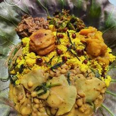 A close-up of the NCF delightful Khechri. This one is served with usoi ooti, morok achar, kanchi eromba, and other traditional Manipuri side dishes.