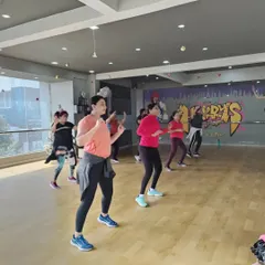 Our ZIN instructor Sujatha leading a power-packed fitness session. Her energy is contagious, and her routines are designed to make you move and sweat.