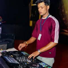 Another angle of me focused on the Pioneer DJ decks, ensuring every beat is perfectly in place.