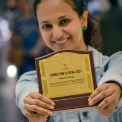 Holding an award for my participation in the 'Zumba for a Cause' 2025 event. I am committed to using my skills to make a positive impact in the community.