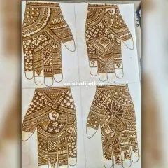 Practicing different palm designs on paper. This helps me refine my patterns and offer a variety of options to my clients.