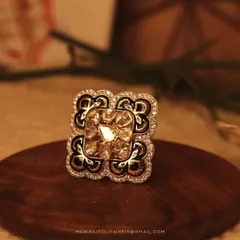 This square statement ring is a perfect example of versatile jewellery. Crafted with uncut diamonds and detailed enamel, its beauty is matched by its ability to also be worn as a pendant for a completely different look.