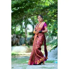 A full-length view of Gagana's Muhurtham look. I ensure the entire look, from the hair to the drape of the saree, is perfect and photographs beautifully.