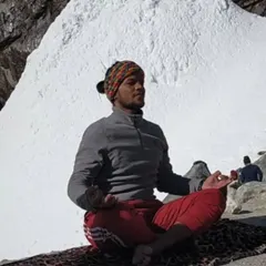 One of our yoga gurus, Chandra Mohan, meditating in the snow-capped mountains. We are blessed to have experienced teachers who embody the yogic path.