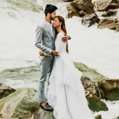 A moment of quiet intimacy amidst the powerful rush of a Kashmiri river. We placed the couple on the rocks to create a beautiful contrast between their calm embrace and the wild nature surrounding them.