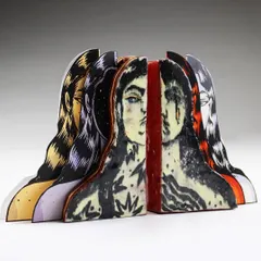 A different arrangement of the 'Confrontation' sculpture, showing how the ceramic and paper elements can be reconfigured to create new compositions.