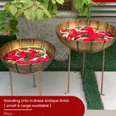 These standing urlis in a brass antique finish are perfect for Navratri or any festive occasion. Fill them with water and flower petals for a traditional welcome.