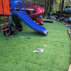 My team at work during the installation in Nainital. We ensure every seam is perfect and the entire surface is smooth and secure for kids to play on.