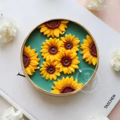 A brand new design featuring my sunflower urli candle. I've set these cheerful, detailed sunflowers against a rich green wax base, scented with 'Mangroves' to evoke the feeling of a forest by the sea.