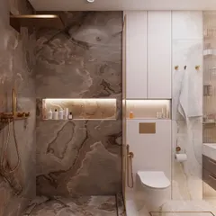 This bathroom design focuses on integrating luxury and practicality. We used dramatic, book-matched marble tiles for the wet area, complemented by warm LED lighting in the shower niche. The wall-mounted toilet and concealed cistern, paired with seamless overhead cabinets, maximize floor space and provide ample, hidden storage for a clutter-free look.