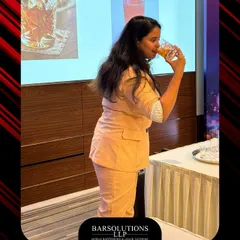 The best part of learning is tasting the results. Amisha samples the finished product, a key step in understanding flavor balance during our masterclasses.