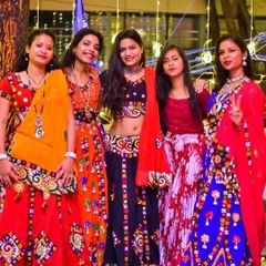 The crowd in full traditional attire at our Dandiya celebration. It's amazing to see everyone come together for nights like these.