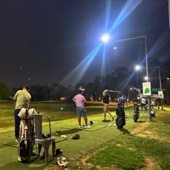 The game doesn't stop when the sun goes down. Our floodlit driving range means your corporate or private event can continue late into the evening, offering a unique night golf experience in Gurugram.