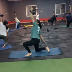 A dynamic group class blending yoga with kettlebells for a unique strength and mobility challenge. This is how we keep workouts interesting and functional.