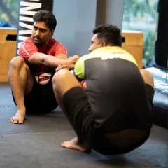 The deep squat hold is a fundamental position for building hip mobility and stability. We practice this to create a strong and durable foundation.