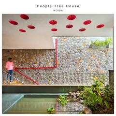The 'pond' at the heart of the People Tree House, shown here in its completed form. This feature was designed to allow birds, insects, and plants to coexist with the human inhabitants, with inverted pots in the ceiling providing roosting spots.
