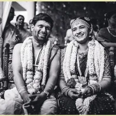 The purest smiles between a bride and groom during their wedding ceremony. We believe in capturing these unscripted, real moments in timeless black and white, focusing on the genuine connection you share.