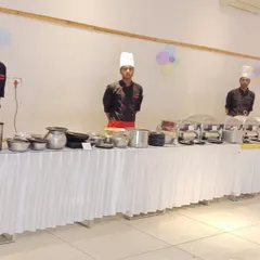 Our chefs and buffet line ready for a birthday celebration. We handle all the food arrangements so you can enjoy the party with your guests.