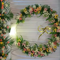 A close-up of the floral wreath for the engagement stage. I used a mix of pastel roses, carnations, and lush greens to create this romantic look.