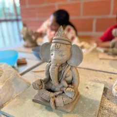 There is a special peace that comes with making a Ganesha idol. This is a close-up of an unfired, eco-friendly clay Ganesha from one of my most loved spiritual workshops.