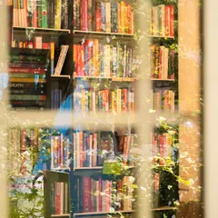 Looking through the window at our bookstore corner. I love how the light catches the spines of the books, each one holding a different world. It’s a peaceful, inviting sight that always makes me smile.