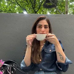 Enjoying every last drop. My denim shirt and simple jewelry make this a comfortable and casual moment.