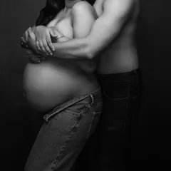 Celebrating the beauty of new beginnings. This intimate and modern couple's maternity portrait, styled with denim, is raw, real, and full of love.