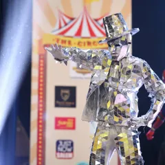 Meet our Mirror Man, the ultimate interactive performer. Covered head to toe in reflective mirrors, he becomes a human disco ball, perfect for greeting guests, livening up the dance floor, and creating amazing photo opportunities.