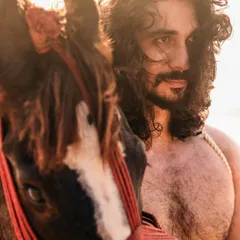 An editorial-style male portrait captured at the beach during golden hour. The goal was to create a raw, untamed look, using the natural elements of the wind and the horse to add a sense of power and freedom. This showcases my ability to direct and capture dynamic on-location shoots.