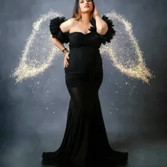 For a touch of magic, I can add creative edits like these sparkling angel wings. It’s a wonderful way to create a truly unique and artistic pregnancy portrait that feels like a fantasy.