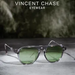 A moody, atmospheric shot of Vincent Chase eyewear. The textured surface and soft background lighting create a sophisticated look for this Lenskart collection piece.