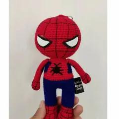 This is a custom-made Spider-Man amigurumi doll, which can be used as a keychain or a small collectible. I crocheted his iconic red and blue suit with black web details and attached my "Hongray Craft" label.