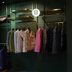 Every choice has the power to speak volumes. Our studio's curated racks, featuring a diverse range of jackets and suits, are where your story begins to take shape.
