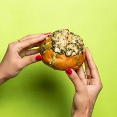This is my Pesto Cream Cheese Bun, a delicious twist on the classic. It's filled with the same creamy goodness but with an added layer of fresh, herby pesto.