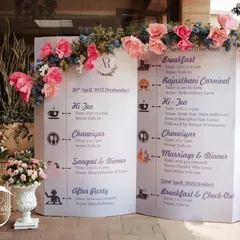 I designed this wedding itinerary as a giant open storybook, adorned with flowers. It's a beautiful and functional piece that informs guests of the events while adding to the fairytale theme.
