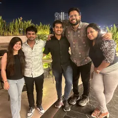 Enjoying a social evening out with friends. A healthy work-life balance is something I advocate for, and it starts with being able to relax and connect with people.