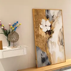 Art should complement your space. This modern abstract painting, featuring a textured 3D flower and gold leaf accents, is designed to add a touch of elegance and sophistication to contemporary homes.