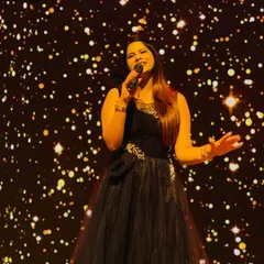 On stage is where I feel most at home. This shot from a sangeet night captures me in my element, ready to get the party started. A professional emcee ensures your event flows smoothly while keeping the entertainment going.