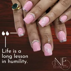 A bold and beautiful pink set. We used a square nail shape and added sparkling silver tips and intricate rhinestone bands for a look that is pure glamour.