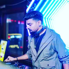 A glimpse of my set at Drava Lounge. I'm focused on the mix, ensuring every transition is smooth and keeps the energy flowing.