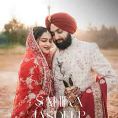A serene and powerful portrait of a Sikh couple, showcasing their traditional wedding attire against a soft, natural background. Our expertise in cultural weddings ensures every detail is captured with respect and artistry.