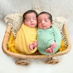 Double the joy, double the love. I have special experience in photographing newborn twins, ensuring both are comfortable and captured beautifully together in coordinated, peaceful poses.
