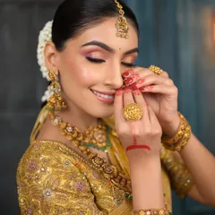 Embracing the timeless beauty of South Indian glam. This look features subtle yet defined eyes, glowing skin, and intricate details that come together for a dreamy, regal finish.