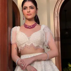 The complete look, exuding modern elegance. The makeup is subtle yet impactful, creating a polished and sophisticated feel for the contemporary bride.