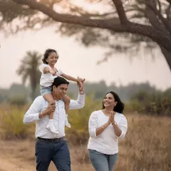 A candid family walk during the magical golden hour. These outdoor sessions are perfect for natural portraits that feel full of life and connection.