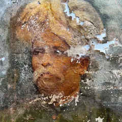 A close-up view of severe paint peeling on an old canvas. This shows the extent of damage I can handle, where large sections of the original artwork are missing and the canvas is exposed.