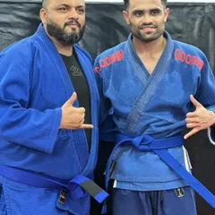 Another proud moment as I award a blue belt to a deserving student. The journey in BJJ is long, and every belt promotion is a testament to a student's commitment.