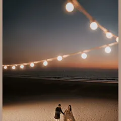 A romantic Sangeet on the beach at dusk. We strung lights over the sand to create a magical, intimate space for the couple to have their moment against the sunset.